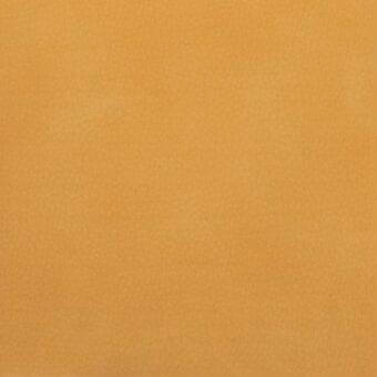 Ochre texture, muted yellow tones, granular matte finish, uniform surface with subtle tonal variations and a soft, velvety quality.